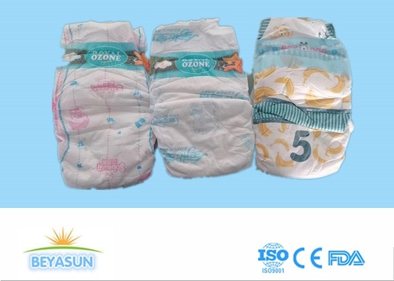 Les couches-culottes de bébé d'OEM Pampers ont adapté la couche aux besoins du client de la meilleure qualité de coton jetable